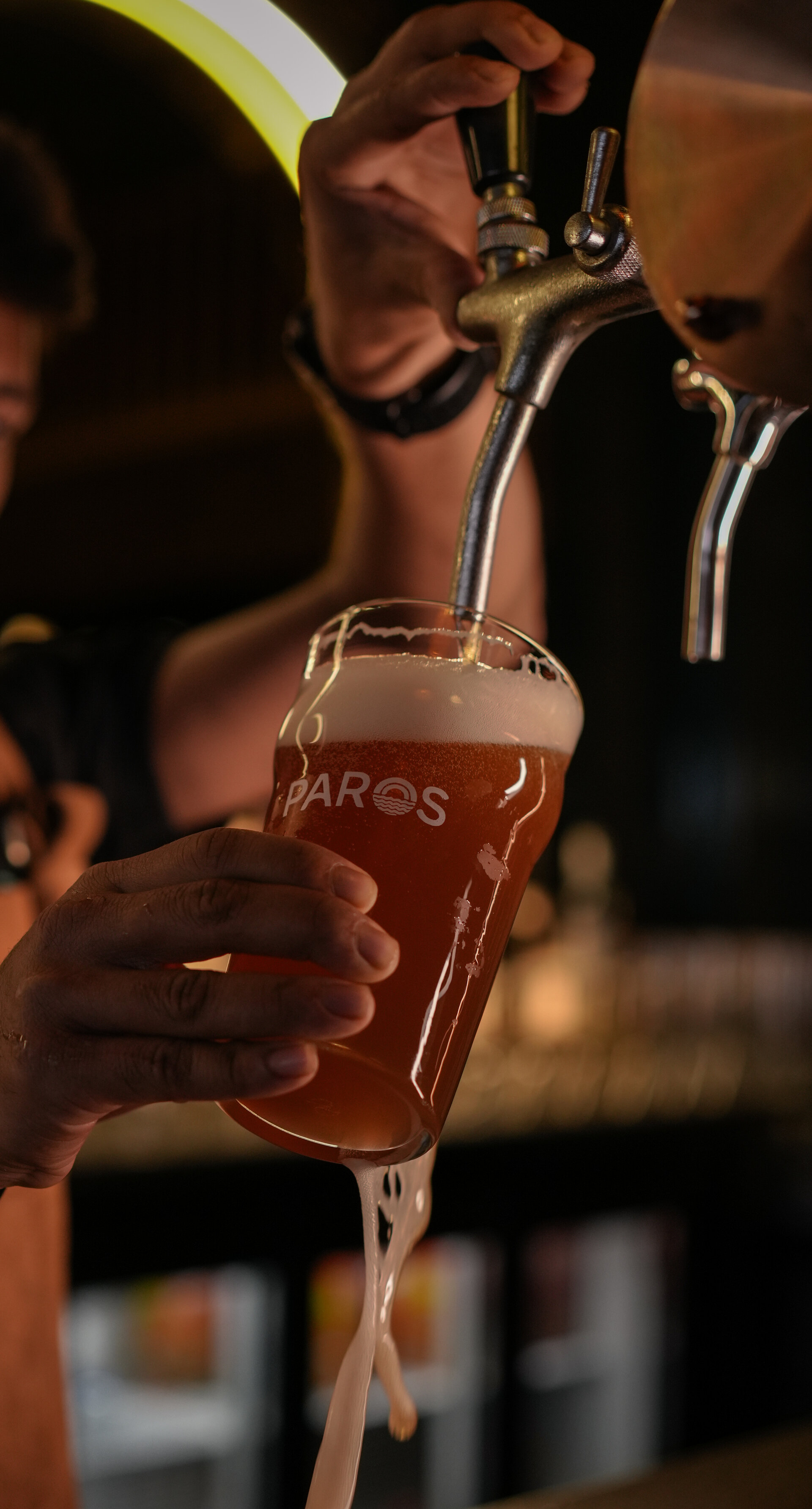 Craft beer pouring at Paros Brewery